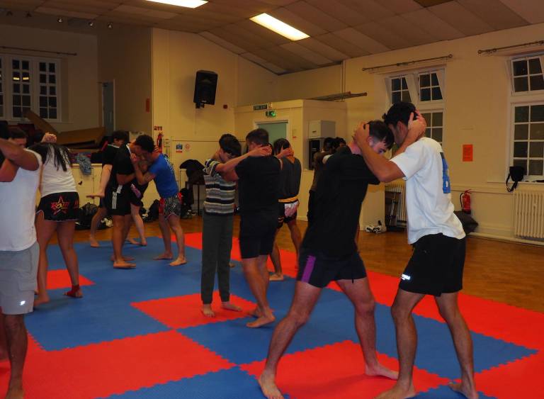 Students practising Muay Thai at Ascend Martial Arts in Swansea
